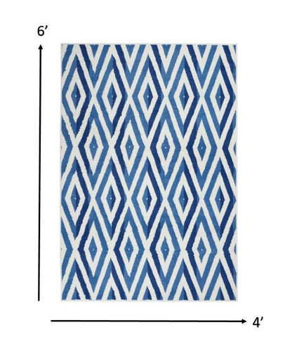 5' X 7' Blue And Ivory Geometric Dhurrie Area Rug