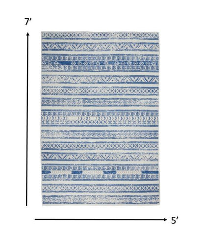 5' X 7' Blue And Ivory Geometric Dhurrie Area Rug