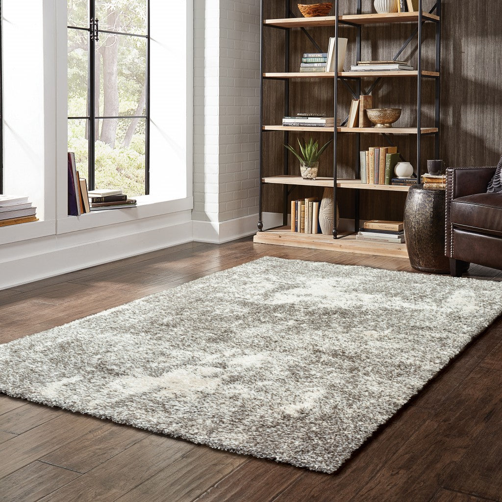 8’ X 11’ Gray And Ivory Distressed Abstract Area Rug