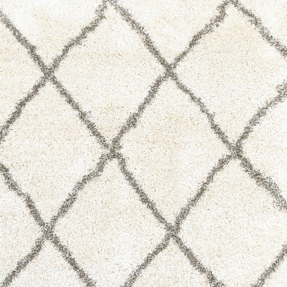 7’ X 10’ Ivory And Gray Geometric Lattice Area Rug