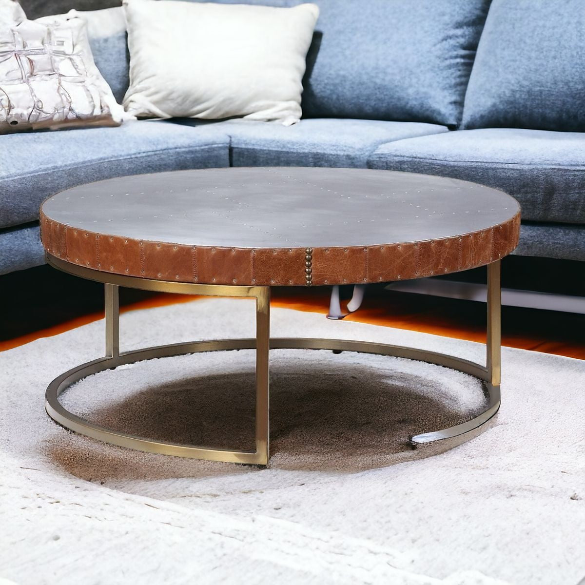 36" Brown And Silver Leather And Metal Round Coffee Table